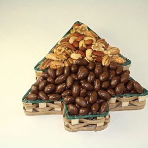 Nuts in christmas tree shaped tin