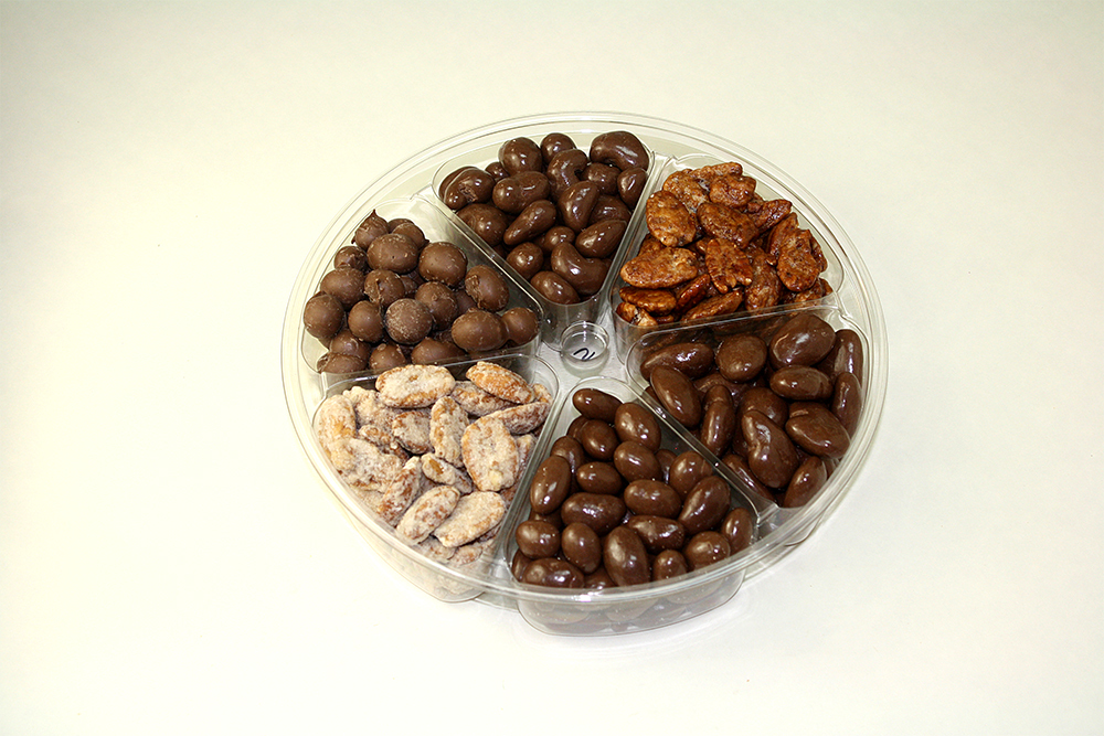 Six selections of candied nuts in tray
