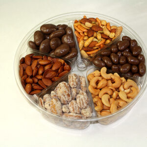 Nut candy tray with almonds, pecans, cashews, and chocolate covered nuts